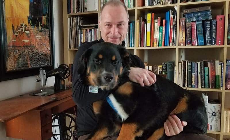 Audwin holding his big dog 48 KB